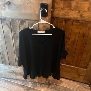 Never worn. Three Bird Nest Black Ruffle Sleeve Blouse